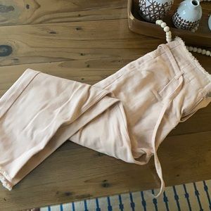 Light pink distressed paper bag jeans